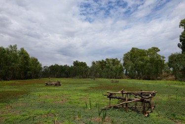 Wooden structures on the dried out lagoon, 