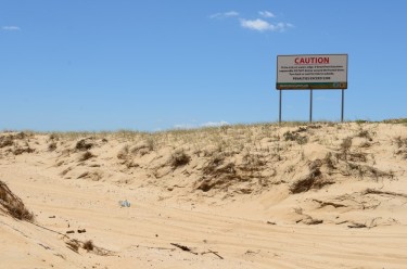 Tracks next to sign