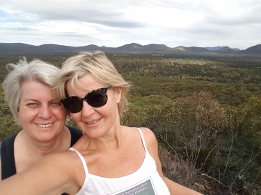 Selfie of me and my sister at the top lookout, looking into Wilpena Pound