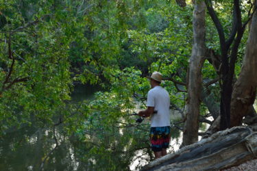 Doc fishing in the lagoon. Is there a croc somewhere?